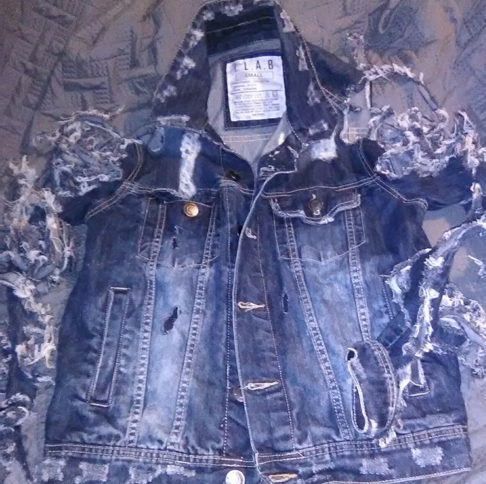 Shredded jean jacket